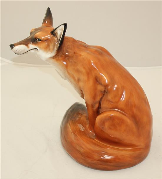 A large Royal Doulton figure of a seated fox, model no.HN2634, 26.5cm